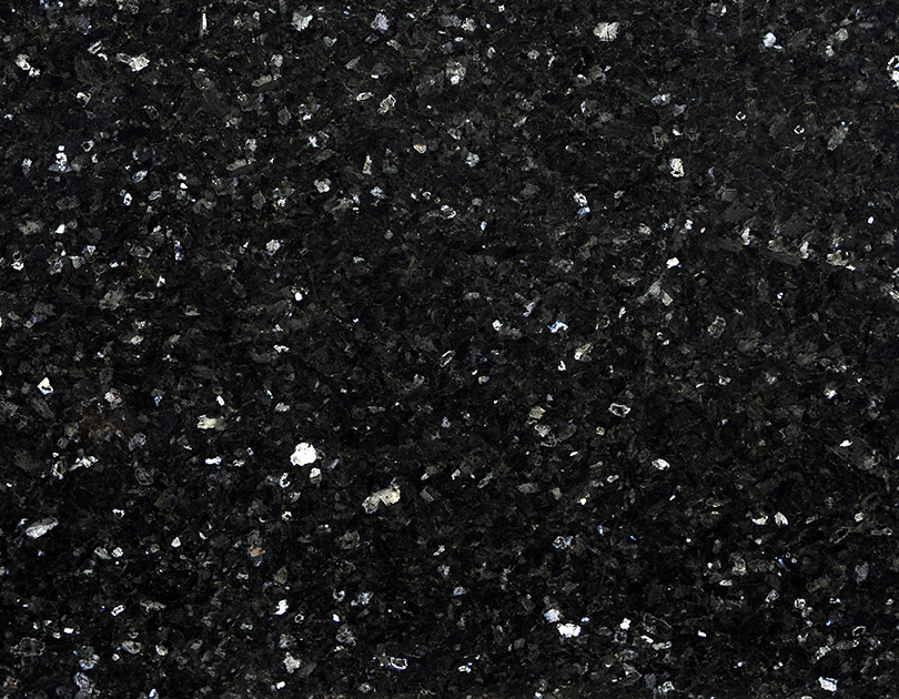 Emerald Pearl features a striking dark base with shimmering green and silver flecks, adding a luxurious touch to any surface.